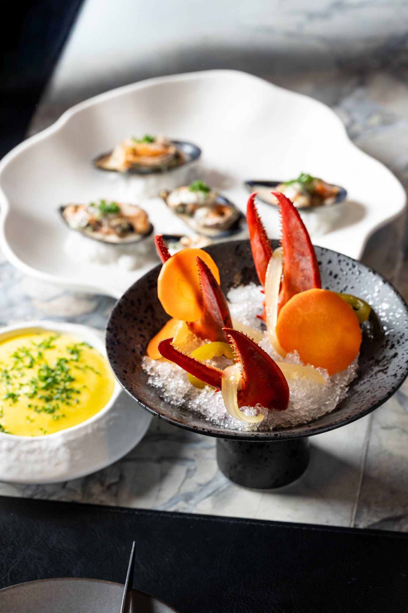 Oysters, lobster, and raw bar bites at Restaurant Lucie